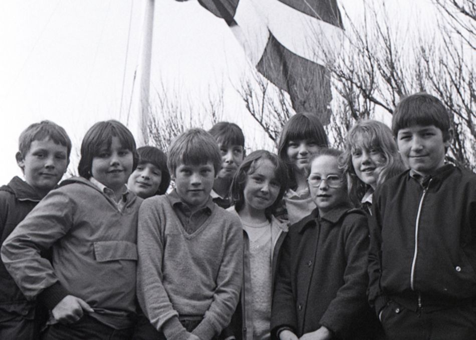 Schoolchildren celebrating St Piran's Day in Porthleven
