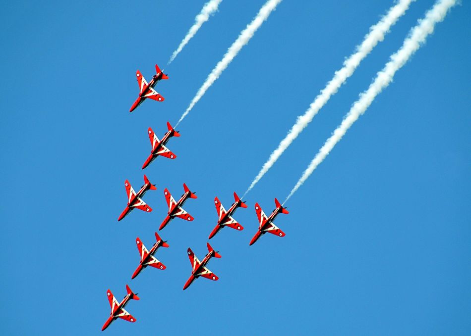 Red Arrows aeroplanes in an aerial display